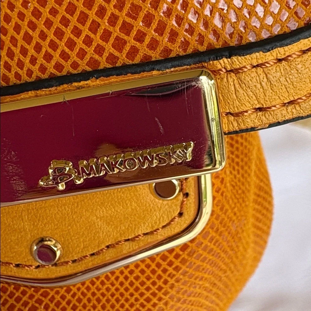 B. Makowsky Orange Hobo Bag